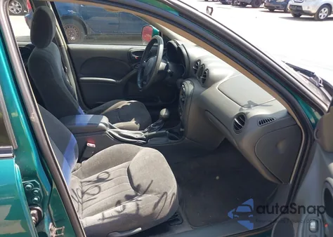 1999 Pontiac Grand Am Se z USA, uszkodzony, nr VIN 1G2NE52E0XC574219